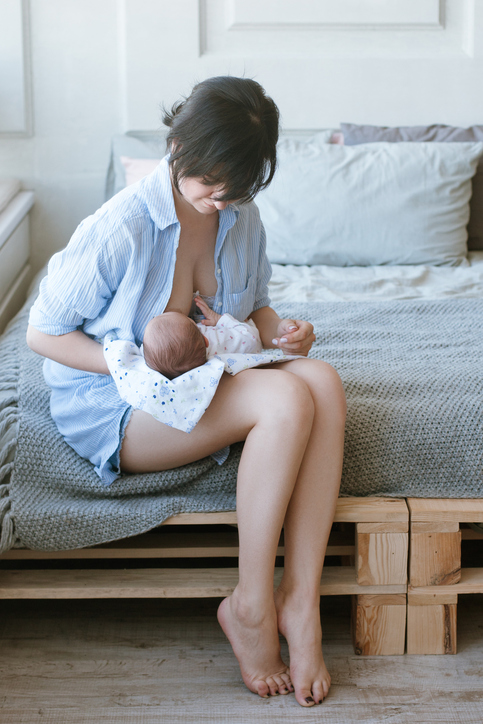 breastfeeding for newborns motherhood concept. helpful tips for feeding the baby. love and tenderness.