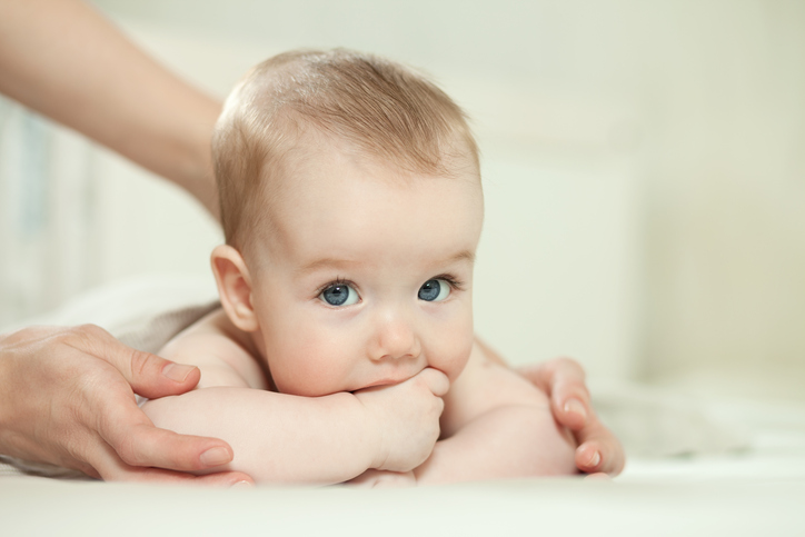 close-up portrait of baby boy and his mother